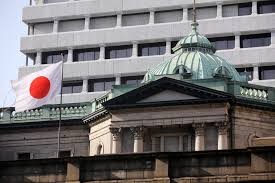 Bank of Japan lifts growth outlook, keeps easy money policy